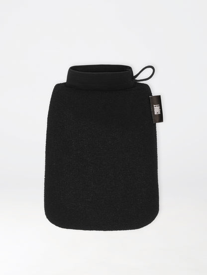 Exfoliating Glove |  | Produktbeskrivning:
Upplev lyxen av en djup och skonsam exfoliering med vår Exfoliating Glove. Perfekt för att avlägsna döda hudceller och förbereda huden för efterf